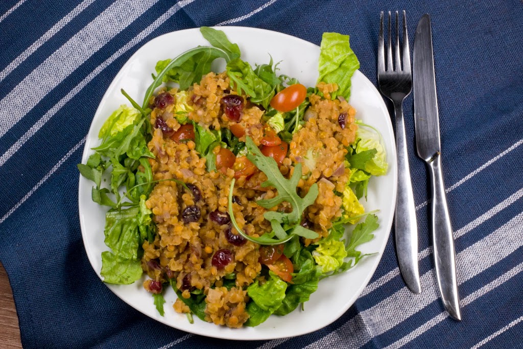 Recipe: Red lentil salad with cranberries and ruccola
