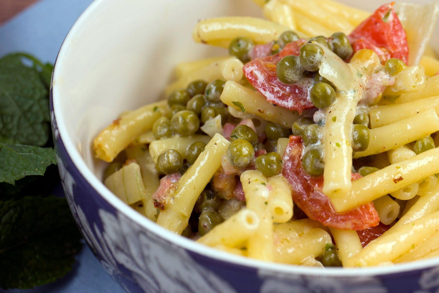 Pasta with mascarpone cream sauce, peas and bacon